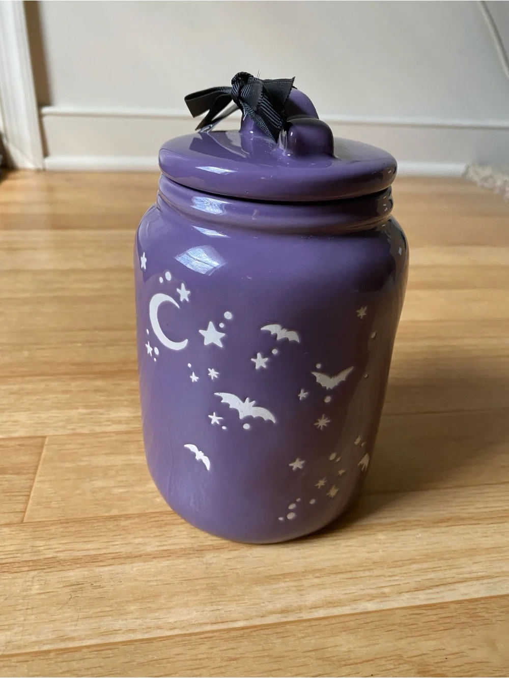 2024 Rae Dunn BOO baby ceramic Halloween canister featuring white bat and stars